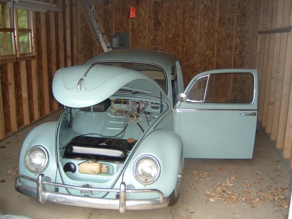 This is my bug when I bought it "as is" in non-running condition.  Young guy had it and "couldn't get it running after he stored it for the winter".  I made a deal on it, threw my tow bar in my Jeep and towed it home 3 hours in a downpour.  Put it in the garage and put some gas in it that weekend and it fired right up.  I drove it to work that next week!