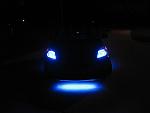 front view of glow w/ blue headlights.